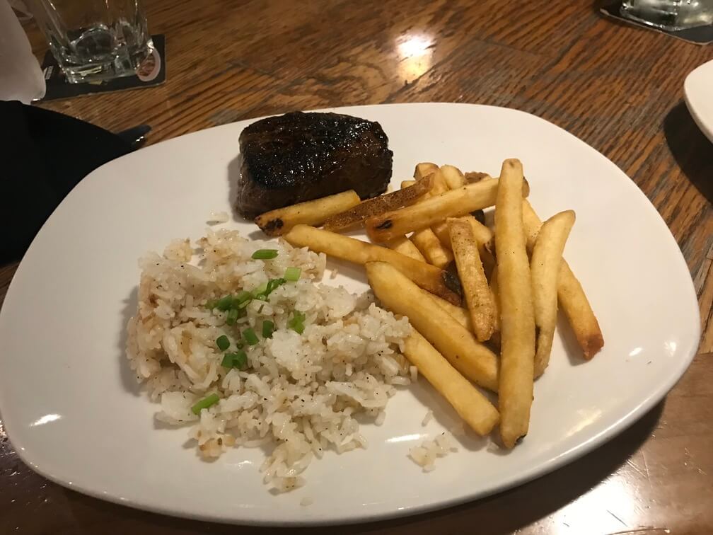 Outback Special Medium Rare with Garlic Rice and Fries in Outback Steakhouse in Makati, Philippines - Archievald Blog